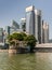 Waterboat house pier with financial district behind, Singapore