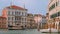 Waterbus or vaporetto ride on Grand Canal, Venice, Italy, on sunny day. 4k handheld smooth footage, tourist POV, reveal