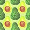 Watercolor avocado seamless pattern on a green background