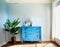 Watercolor of Blue wall commode decor in living