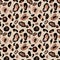 Watercolor cheetah print. Leopard coat seamless pattern on warm brown beige background. Wild animal skin