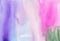 Watercolor colorful liquid background texture. Purple, pink, white, green watery backdrop.