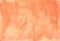 Watercolor coral background texture. Orange aquarelle backdrop. Brush strokes on paper