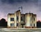 Watercolor of a deserted building with lights off