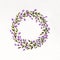 Watercolor floral wreath with lavender, green leaves and branches