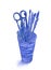 Watercolor hand drawn sketch illustration of glass with contours of stationery goods: pens, scissors, brushes. deep blue color.