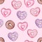 Watercolor heart donuts seamless pattern on pink background