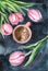 Watercolor illustration with a cup of coffee on a spring morning, with pink tulips
