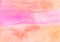 Watercolor light pink and peach color background painting. Watercolour pastel orange and fuchsia liquid texture. Soft backdrop