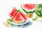 Watercolor painting of watermelon slices on a plate, a half-cut watermelon, and honey drizzling from a dipper