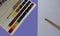 Watercolor paints brush pencil sheet paper in lilac fashionable color. very peri