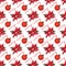 Watercolor seamless pattern with branches, leaves of blooming poinsettia and Christmas balls