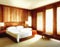 Watercolor of Serene wood bedroom adorned with AI