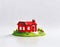 Watercolor of Small red decorative house on a white