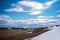 Watercolor smeared clouds in the blue sky in the middle of the mighty Altai mountains