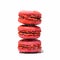 A watercolor of a stack of three pink strawberry macaroons on a