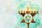 watercolor style and abstract image of jewish holiday Hanukkah with menorah & x28;traditional candelabra