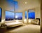Watercolor of vibrant luxury penthouse bedroom at night