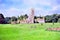 Watercolour painting. Franciscan friary ruins and golf course, Ireland.