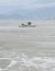Watercraft on a background of gray sea