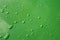 Waterdrops on green background