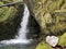 Waterfall at Aberenbach stream or Aberenbachfall waterfall Aberenbachfall Wasserfall near alpine Lake WÃ¤gitalersee