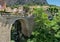 Waterfall and ancient arched bridge, Moustier-Sainte-Marie, France