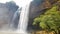 A waterfall is an area where water flows over a vertical drop or a series of steep drops in the course of a stream or river