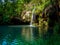 Waterfall and a beautiful lagoon lake for relaxing in the summer