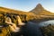 Waterfall with the big mountain in Iceland