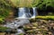 Waterfall blurred on the river Ennig; at the Pwll y Wrach nature reserve