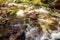 Waterfall in blurring with a flowing waters.