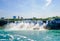 Waterfall and buildings viewed from across Niagara River