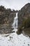Waterfall in Bujaruelo valley in Ordesa y Monte Perdido national park with some snow