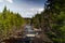 Waterfall on a Canadian river, Quebec, in spring