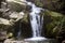 Waterfall in carpathian forest
