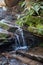 Waterfall cascade in the garden