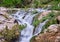 Waterfall cascades in the cava grande del cassibile in sicily