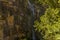 A waterfall cascades down the side of a mountain in the Sierra Nevada mountains outside Monachil, Spain