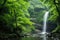 waterfall cascading through the misty, green foliage