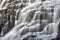 Waterfall cascading water closeup