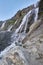 Waterfall in the Caucasus mountains, melting glacier ridge Arkhyz, Sofia waterfalls. Beautiful high mountains of Russia, the river