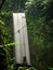 Waterfall close up. Peaceful nature. Balance stones. Beautiful landscape. Motion water. Slow shutter speed. Tibumana waterfall in