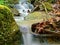 Waterfall closeup among rocks and moss.