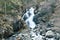 Waterfall in the Comapedrosa Natural Park in Arinsal, La Massana, Andorra.