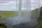 Waterfall curtain from the seljalandsfoss waterfall