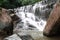 Waterfall in deep rain forest jungle.