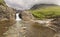 Waterfall in Fairy Pools rocky stream on Isle of Skye