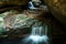 Waterfall flow through cavern