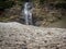 Waterfall flowing from the hill in Kashmir India. Waterfall flowing down from the hill